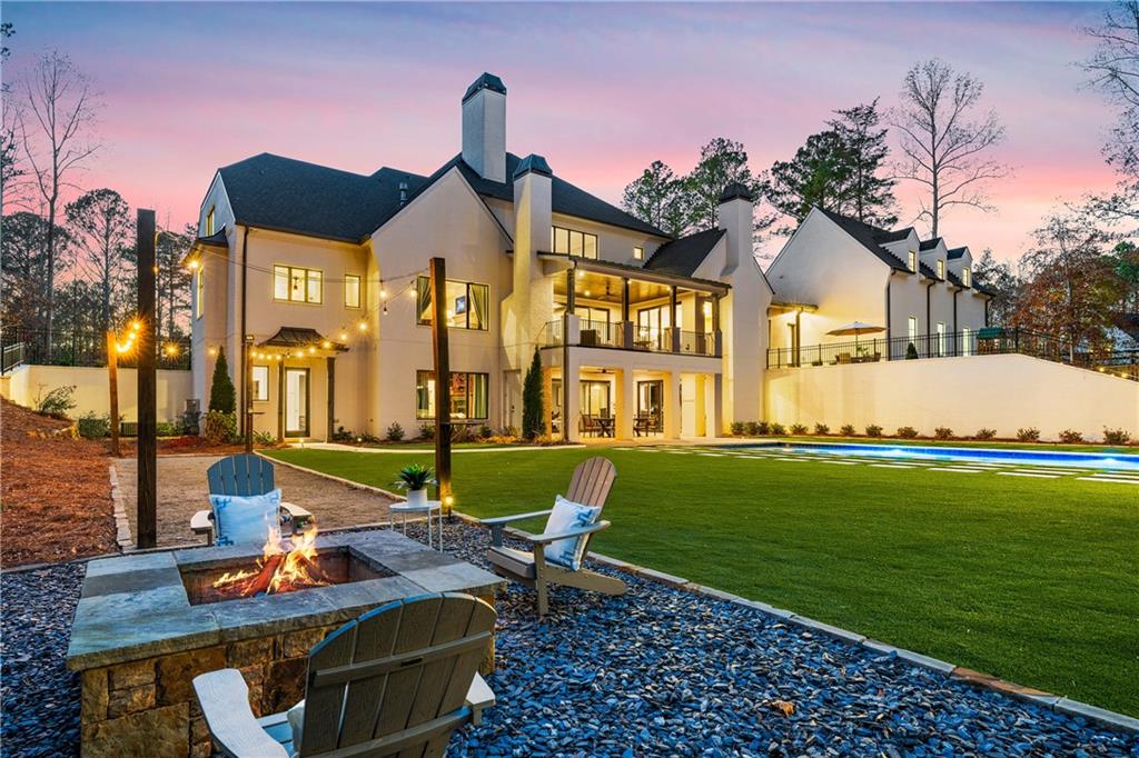 1002 Overlook Terrace Ball Ground, GA 30107 - Photo 73 of 100 a view of an house with backyard and patio