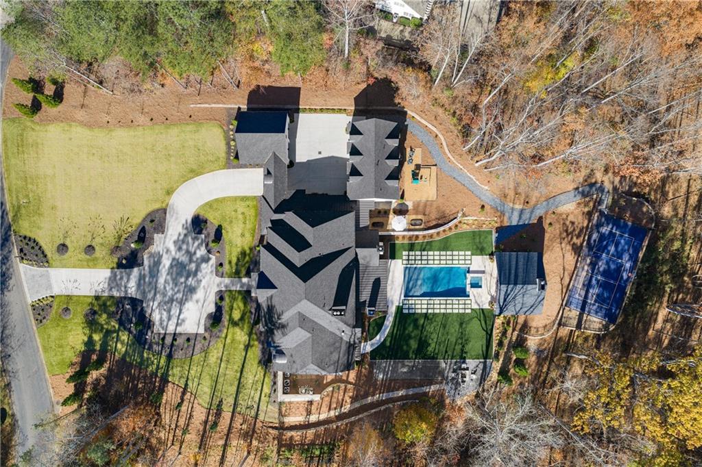 1002 Overlook Terrace Ball Ground, GA 30107 - Photo 89 of 100 front view of a house with a small yard