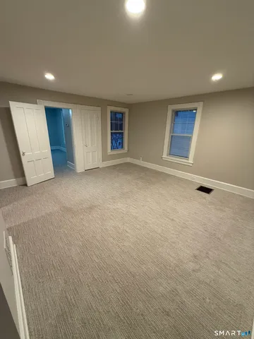 an empty room with windows