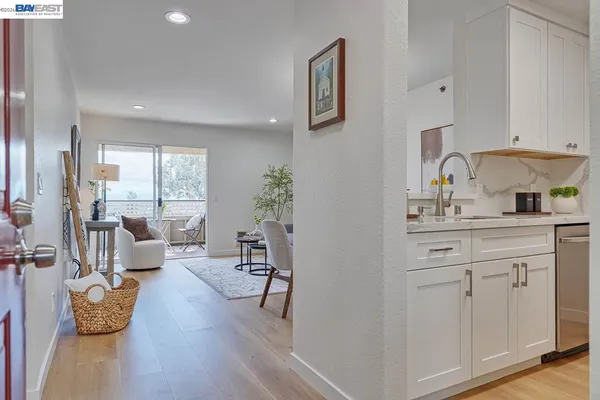 a spacious bedroom with a bed and a couch