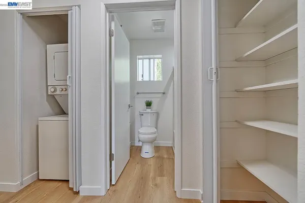 a bathroom with a sink vanity and mirror