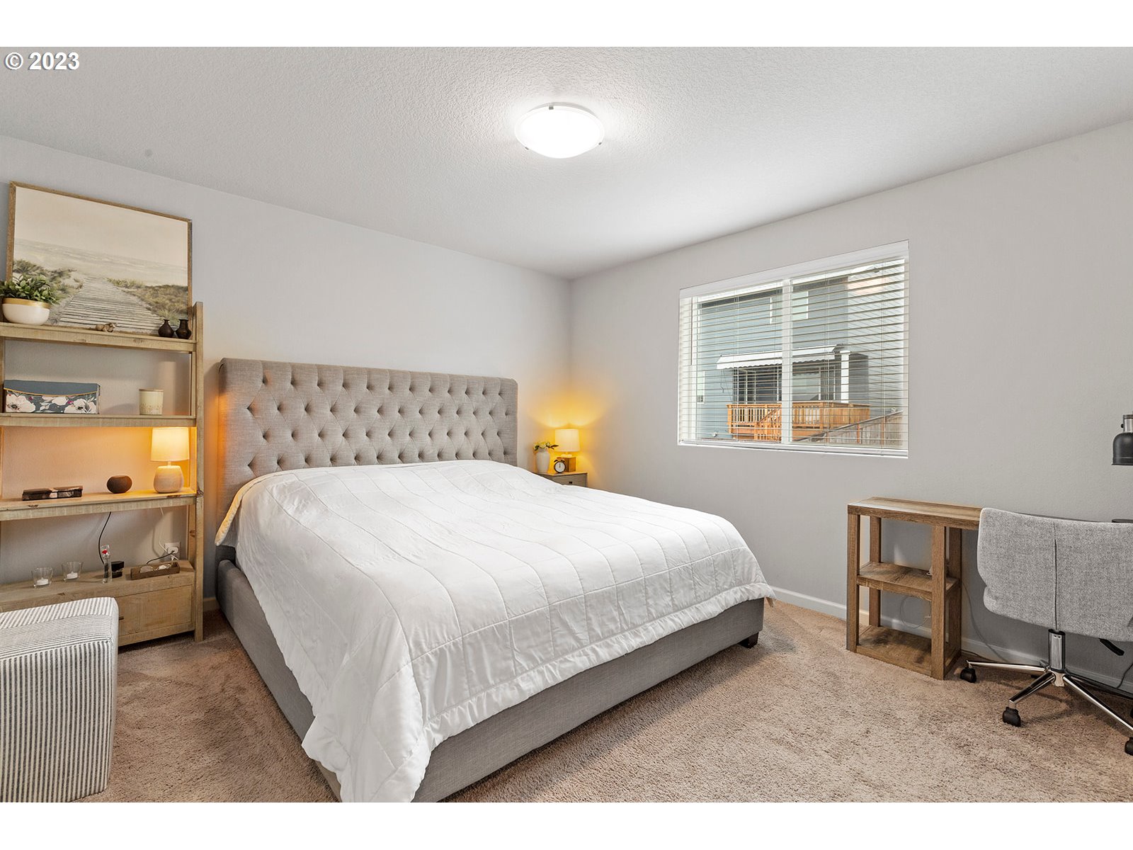 3722 South 39th Place Ridgefield, WA 98642 - Photo 39 of 45 a bedroom with a bed lamps and window