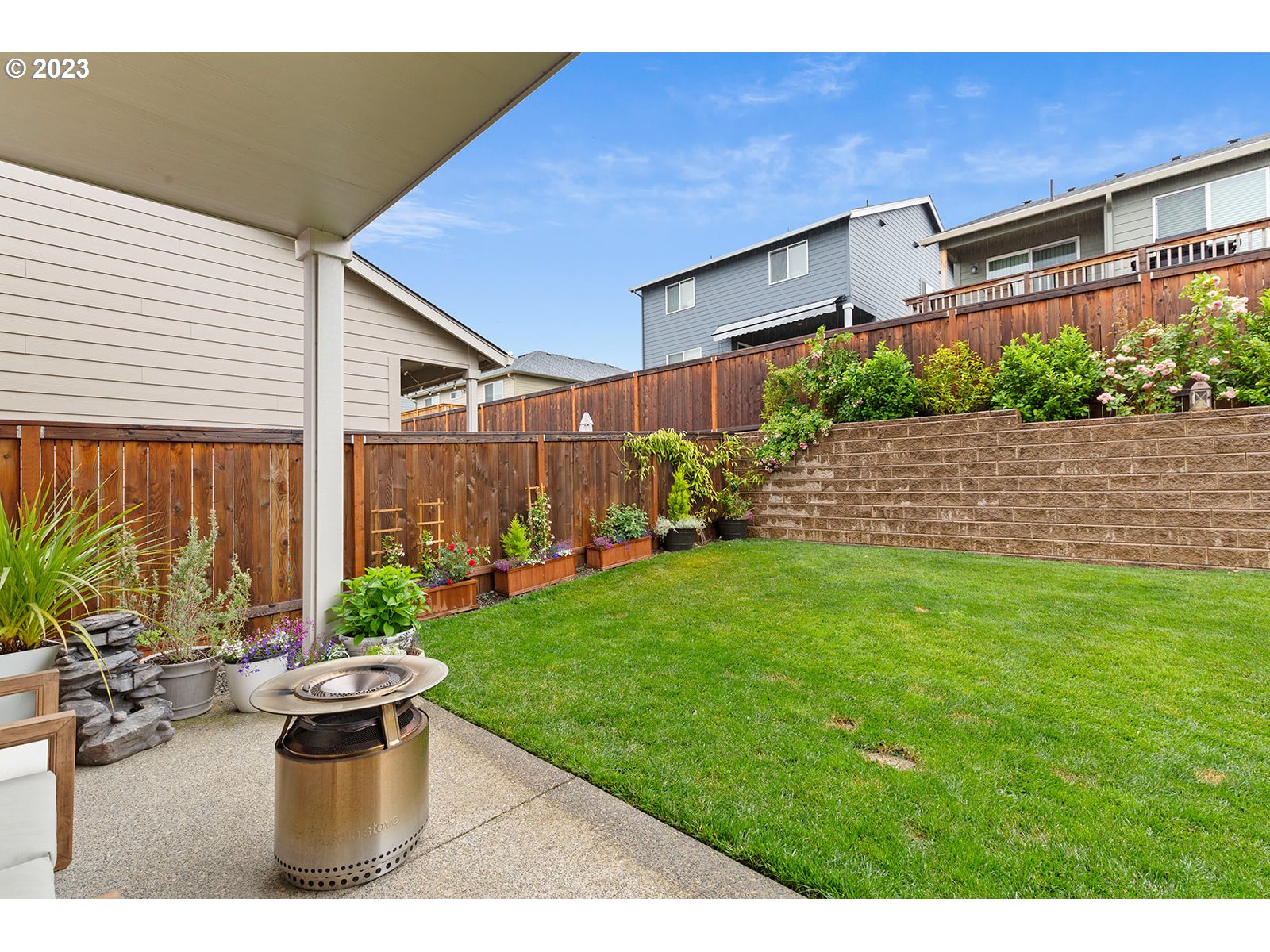 3722 South 39th Place Ridgefield, WA 98642 - Photo 43 of 45 a view of a backyard with plants and a patio