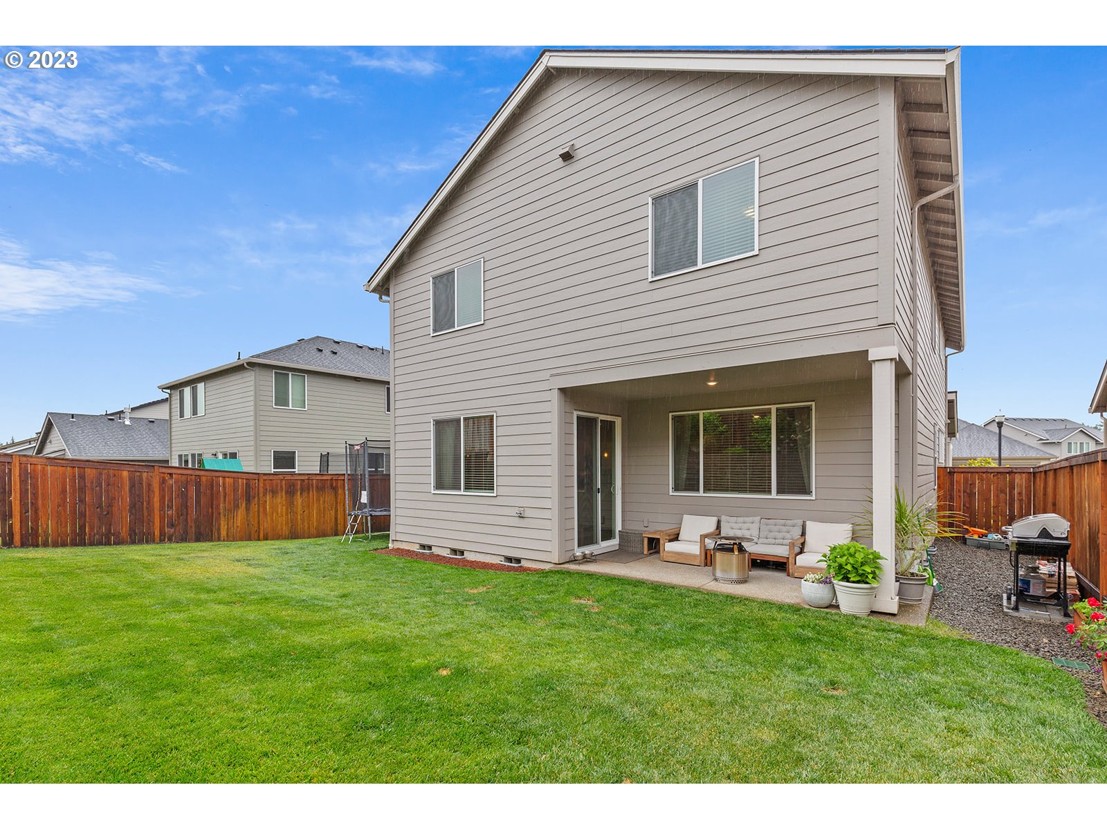 3722 South 39th Place Ridgefield, WA 98642 - Photo 45 of 45 a front view of house with yard and outdoor seating