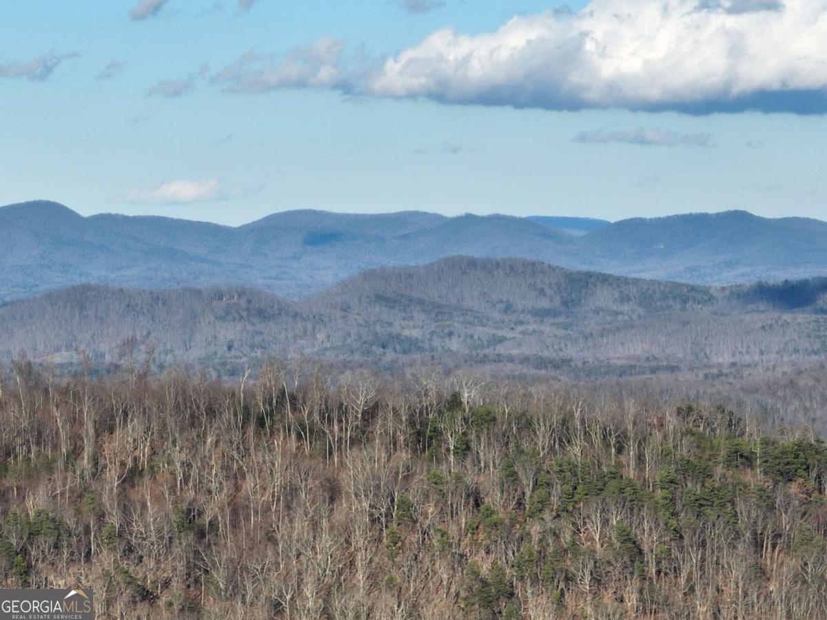 a view of an outdoor space and mountain view