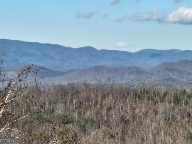 a view of an outdoor space and mountain view