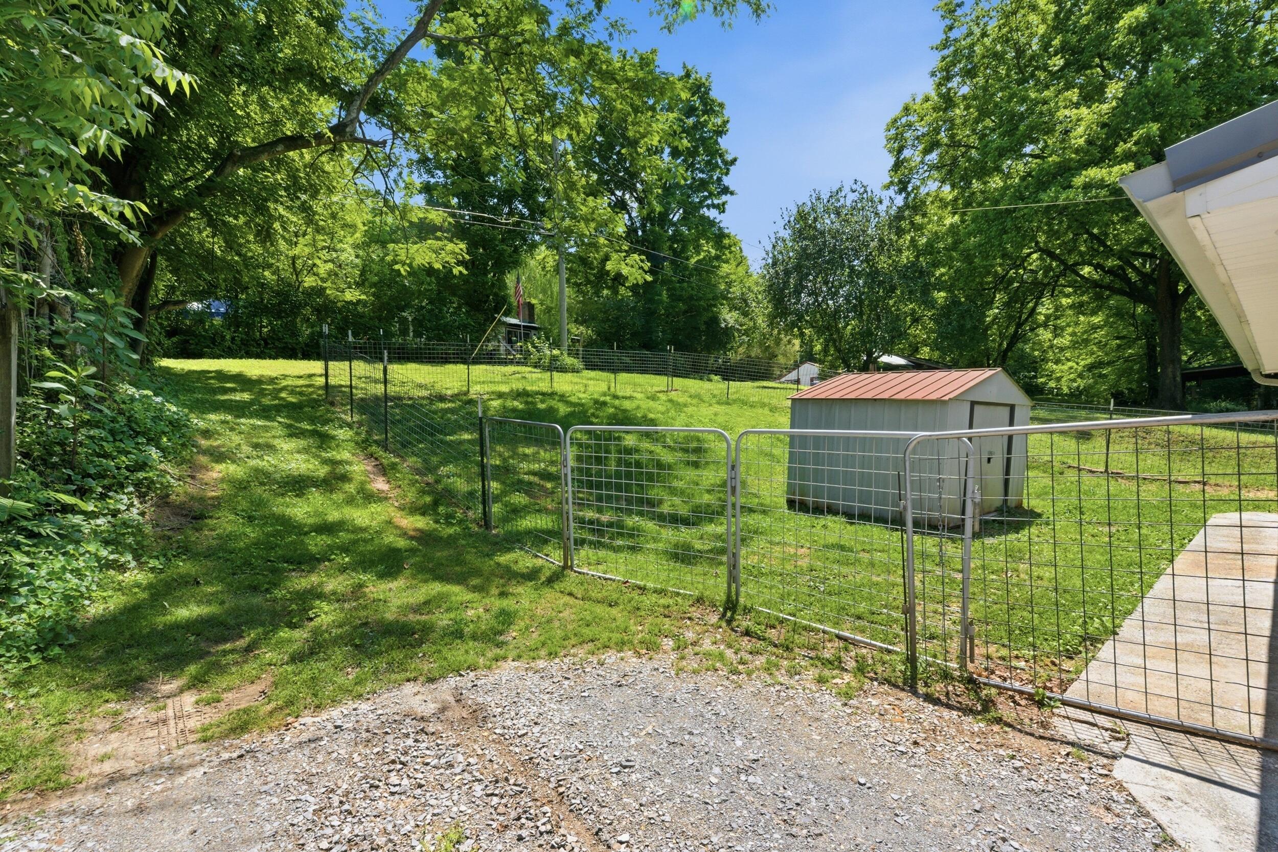 121 Sharp Road Athens, TN 37303 - Photo 18 of 22 121 Sharp Rd - Backyard 1