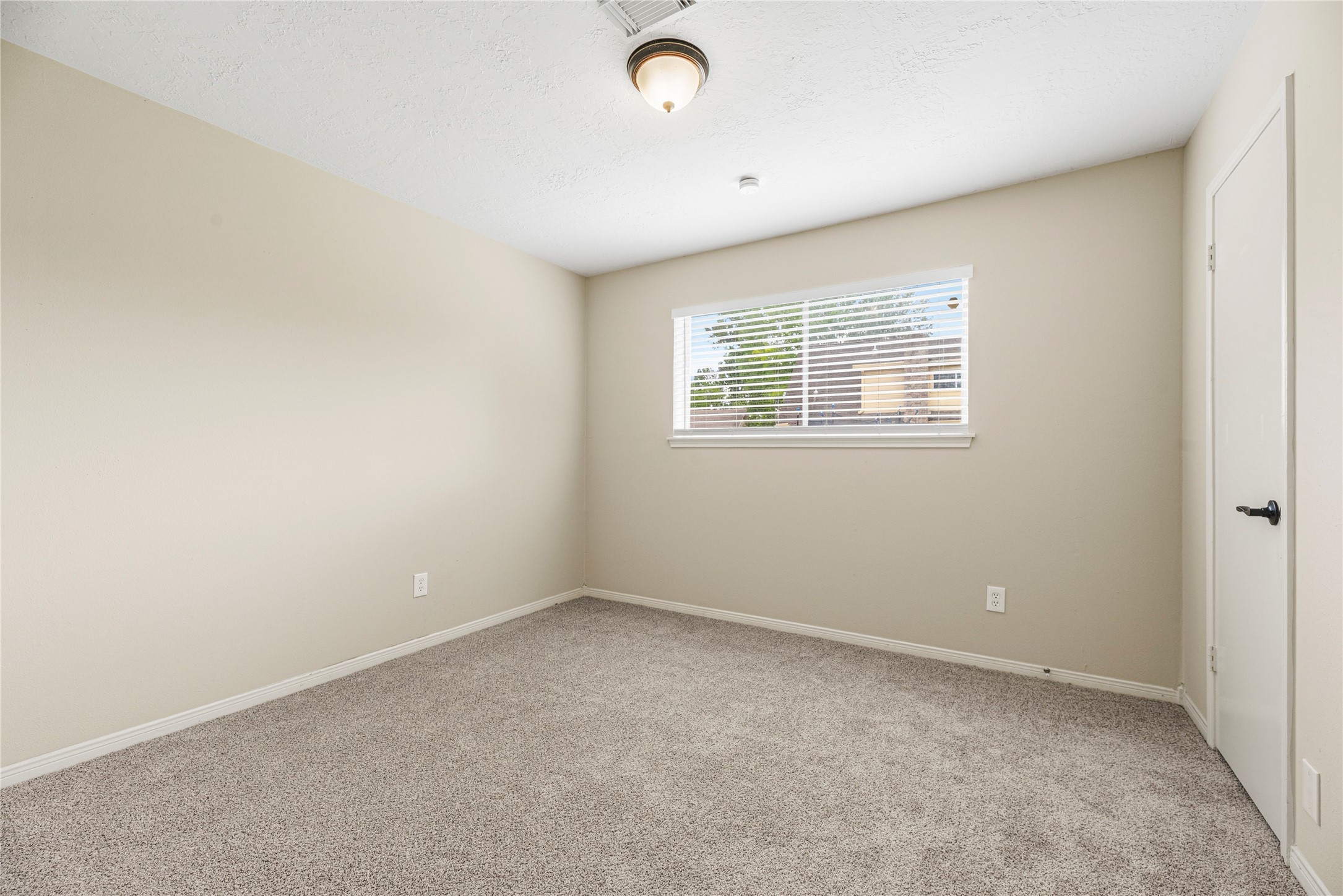 6931 Sandy Knolls Drive Spring, TX 77379 - Photo 17 of 21 Third bedroom is perfect for guests or a family member to wind down before bedtime.
**6931 Sandy Knolls Dr., Spring, TX 77379**