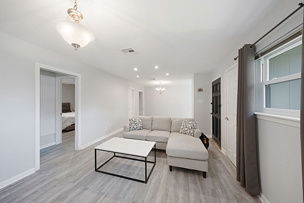 614 Gilpin Street Houston, TX 77034 - Photo 5 of 27 As you look back from the living space you see the open concept layout of the home's footprint.