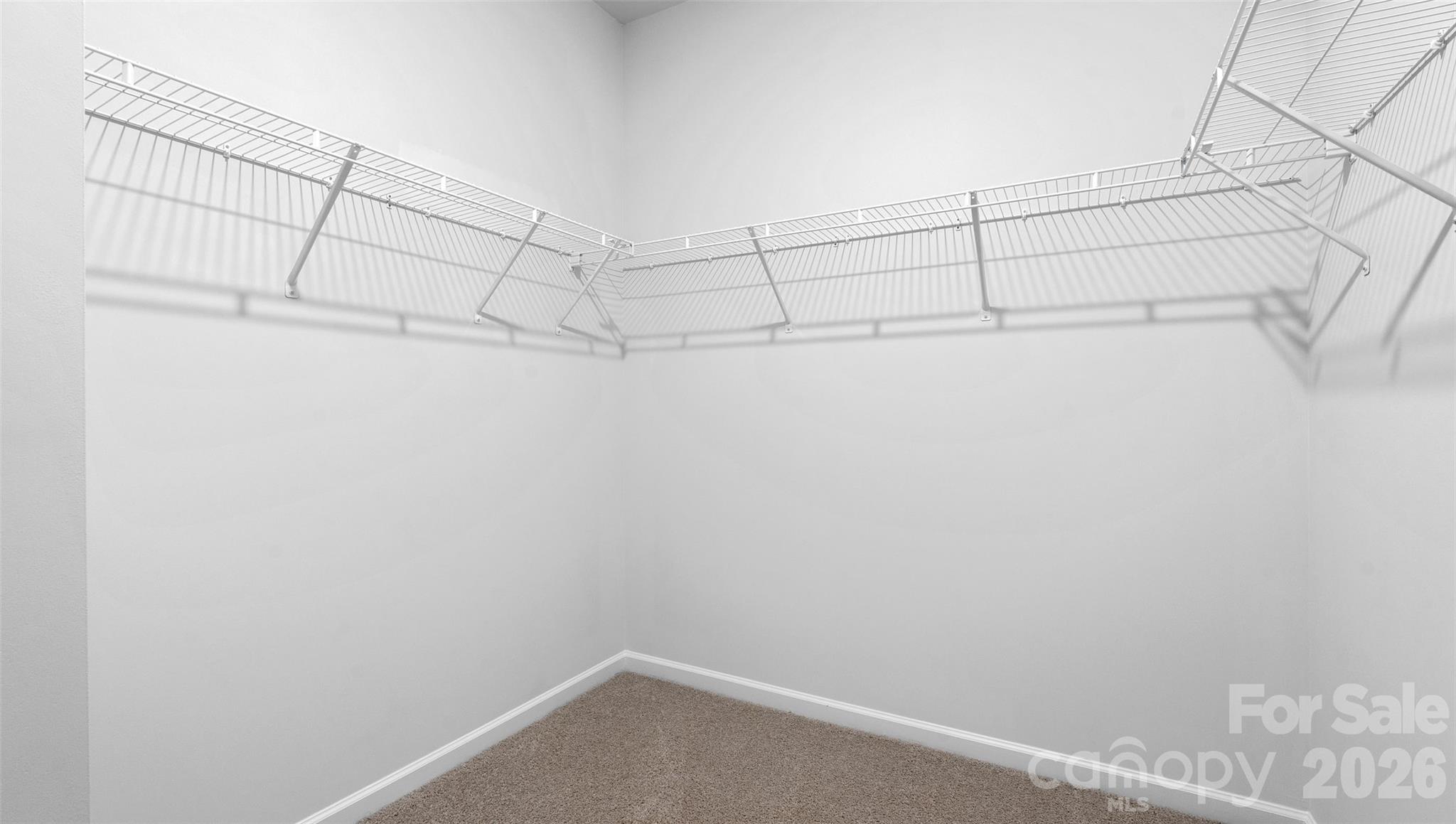 107 Bovine Br Road Fletcher, NC 28732 - Photo 14 of 20 a view of a room with racks on the wall