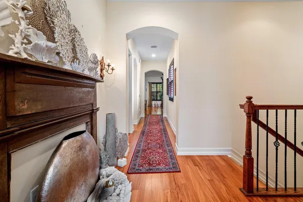 a view of living room with wooden floor
