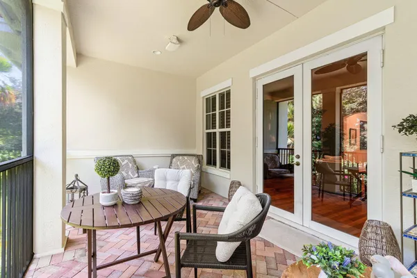 a view of a dining room with furniture and window