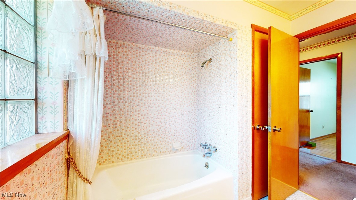 34615 Pettibone Road Solon, OH 44139 - Photo 34 of 40 Bathroom with shower / tub combo with curtain