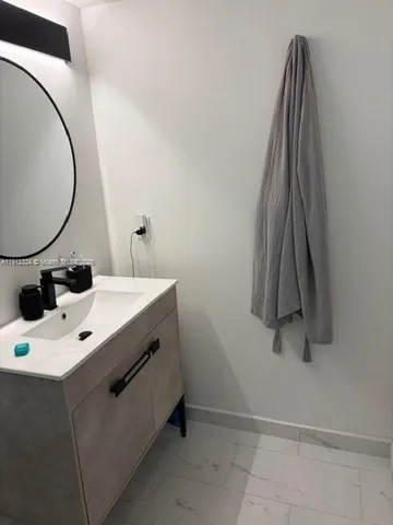 a view of a backyard with a garden and plants