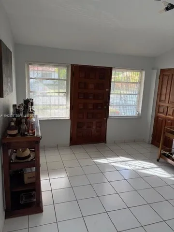 a view of an empty room and window