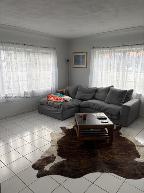 1911 Southwest 23rd Street Miami, FL 33145 - Photo 5 of 25 a living room with furniture and a window