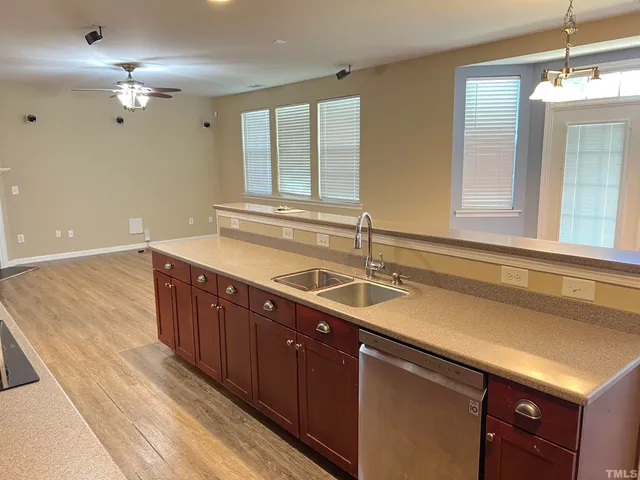 a view of a yard with a tree