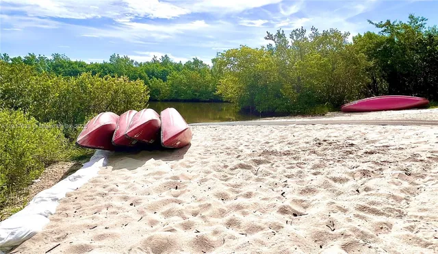 a front view of a house with parking space
