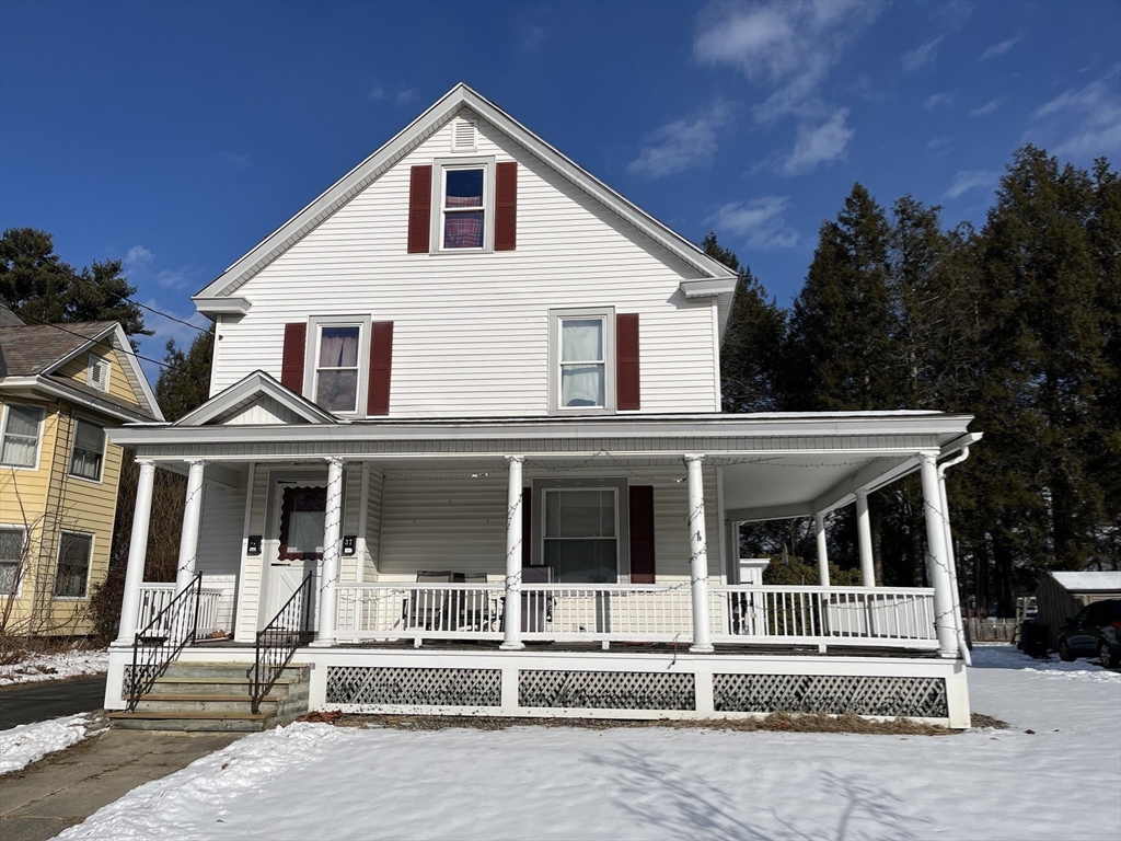 37 Cleveland Street Greenfield, MA 01301 - Photo 11 of 11 front view of a house with a porch