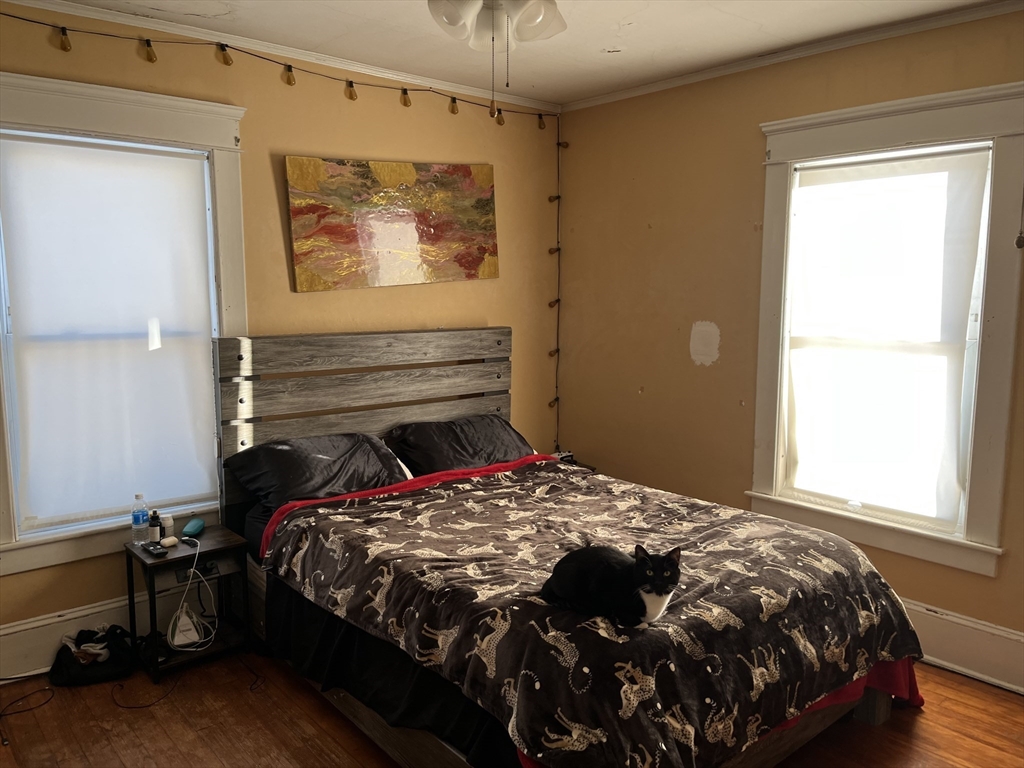 37 Cleveland Street Greenfield, MA 01301 - Photo 9 of 11 a bedroom with a bed and a window