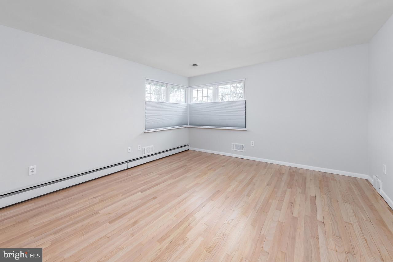 901 Pennsylvania Avenue Cherry Hill, NJ 08002 - Photo 15 of 20 wooden floor in an empty room