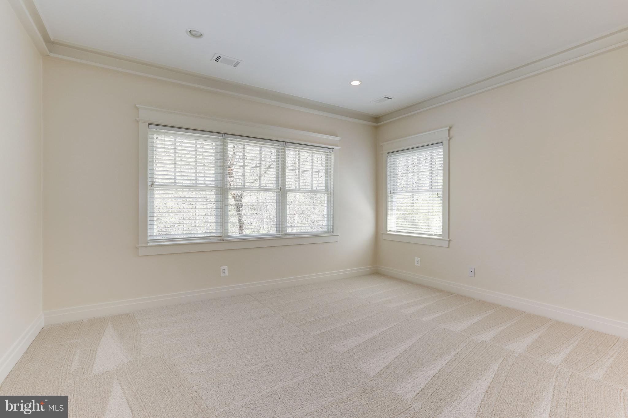 8610 Fernwood Road Bethesda, MD 20817 - Photo 20 of 30 a view of an empty room with a window