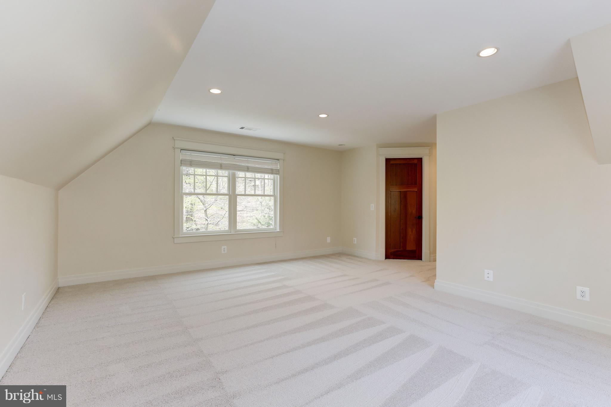 8610 Fernwood Road Bethesda, MD 20817 - Photo 22 of 30 a view of an empty room with a window