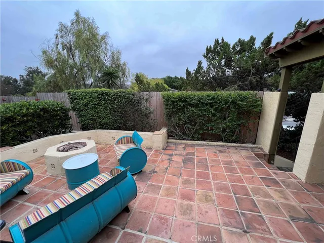 a view of an outdoor space with furniture