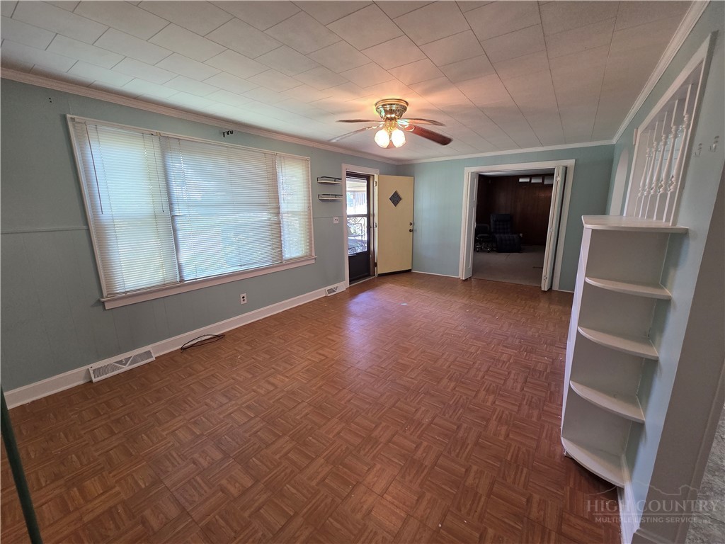 145 Black Oak Ridge Road Taylorsville, NC 28681 - Photo 9 of 39 wooden floor in an empty room with a window