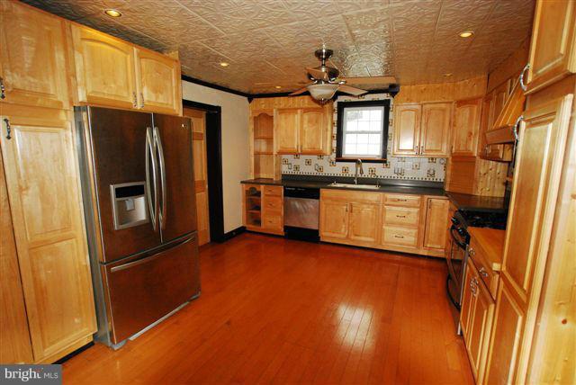 9529 Ridgely Avenue Baltimore, MD 21234 - Photo 3 of 17 Kitchen w/custom cabinetry & Stainless