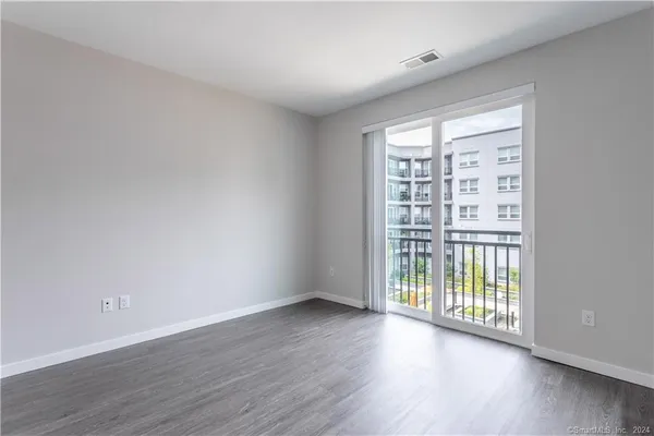 a kitchen with a sink and a stove top oven