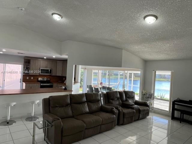 600 Southeast 25th Lane Homestead, FL 33033 - Photo 18 of 25 a living room with furniture and a flat screen tv
