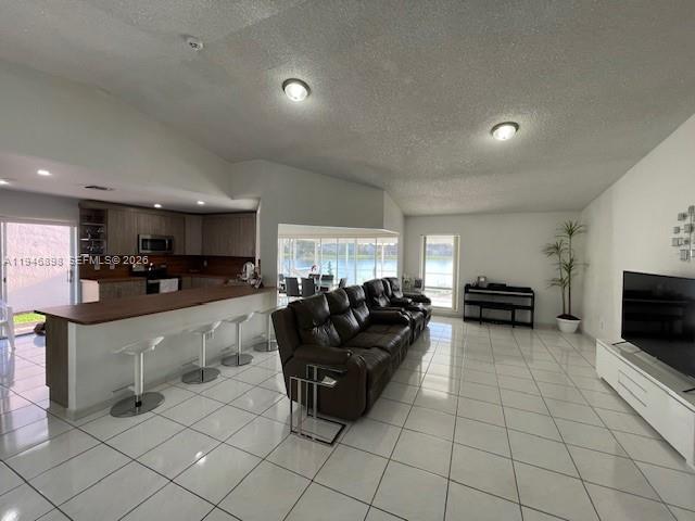 600 Southeast 25th Lane Homestead, FL 33033 - Photo 19 of 25 a living room with furniture and kitchen