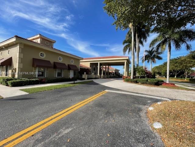 600 Southeast 25th Lane Homestead, FL 33033 - Photo 20 of 25 a front view of a house with a yard