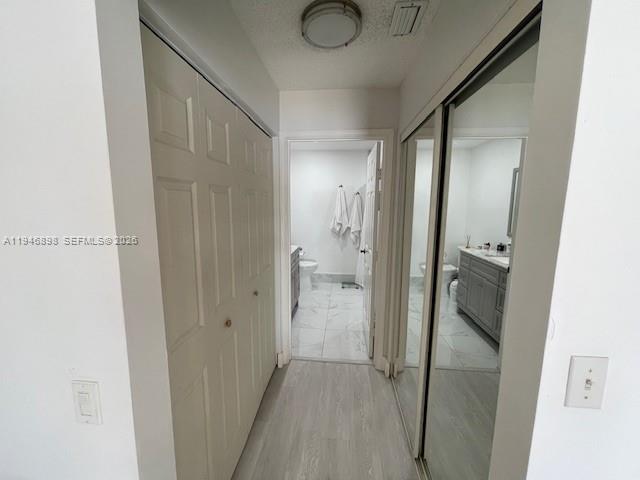 600 Southeast 25th Lane Homestead, FL 33033 - Photo 6 of 25 a view of a bathroom from a hallway