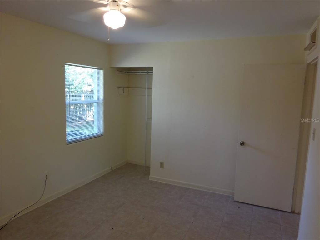 217 Northwest 36th Drive Gainesville, FL 32607 - Photo 12 of 16 an empty room with a window