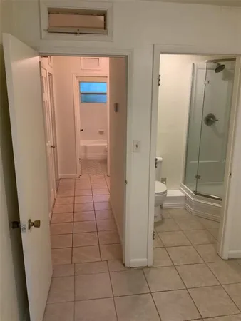 a bathroom with a sink and a shower
