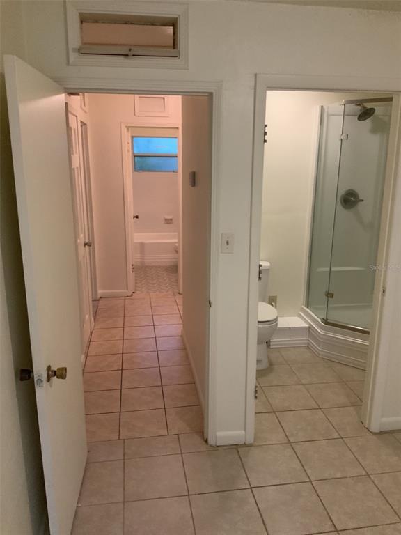 217 Northwest 36th Drive Gainesville, FL 32607 - Photo 6 of 16 a bathroom with a sink and a shower