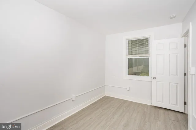 a view of yard with small trees