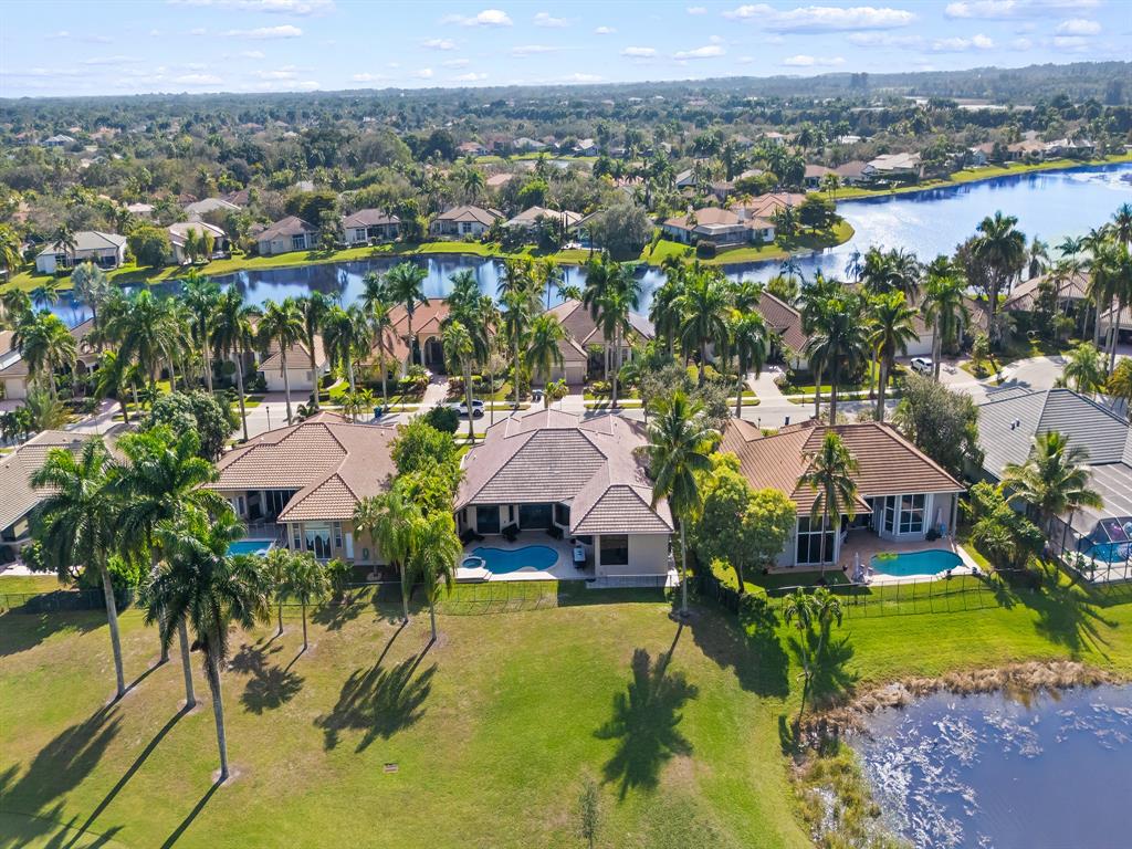 2583 Mayfair Lane Weston, FL 33327 - Photo 15 of 61 an aerial view of residential houses with outdoor space and swimming pool