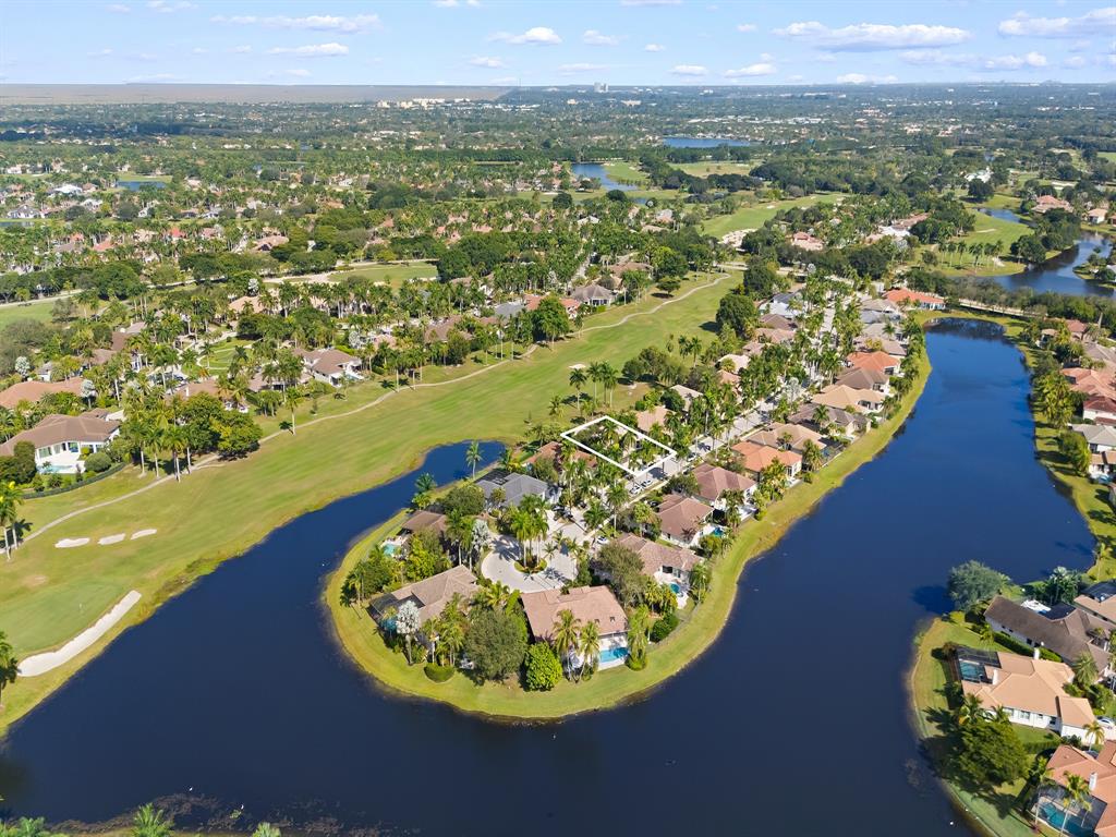 2583 Mayfair Lane Weston, FL 33327 - Photo 19 of 61 a view of a lake with a mountain