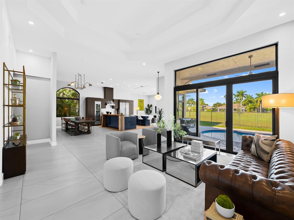 2583 Mayfair Lane Weston, FL 33327 - Photo 23 of 61 a living room with furniture and a large window
