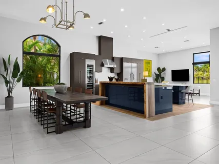 a view of living room filled with furniture and window