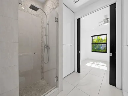 a kitchen with a sink and stainless steel appliances