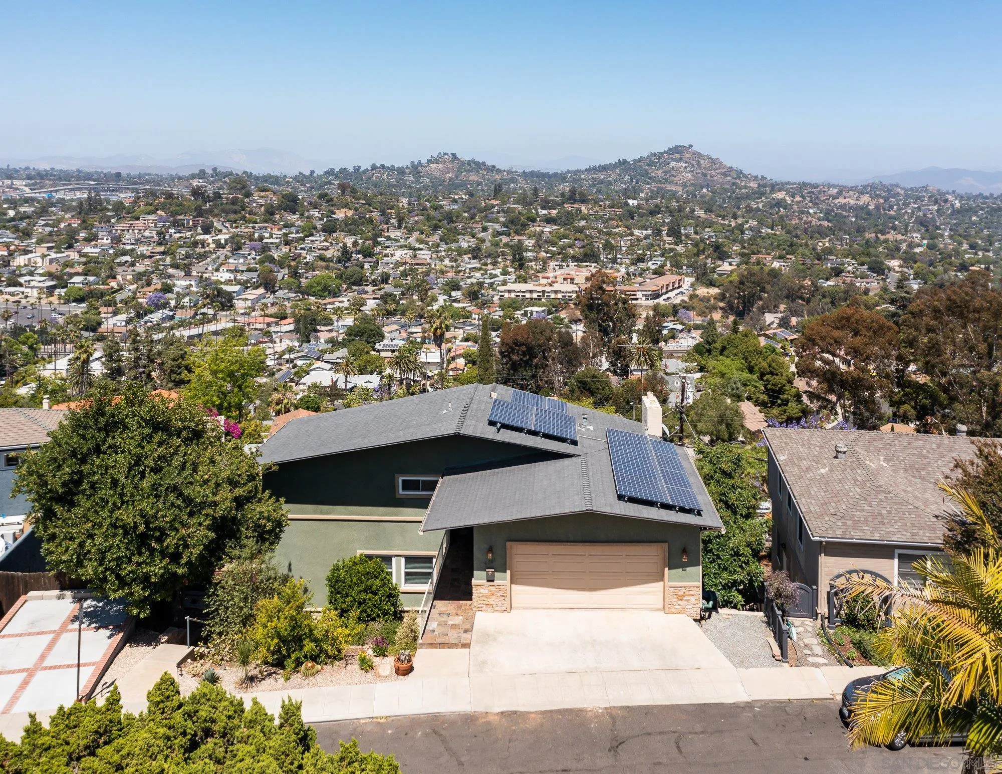 4361 Valle Drive La Mesa, CA 91941 - Photo 1 of 67 an aerial view of a house with a mountain