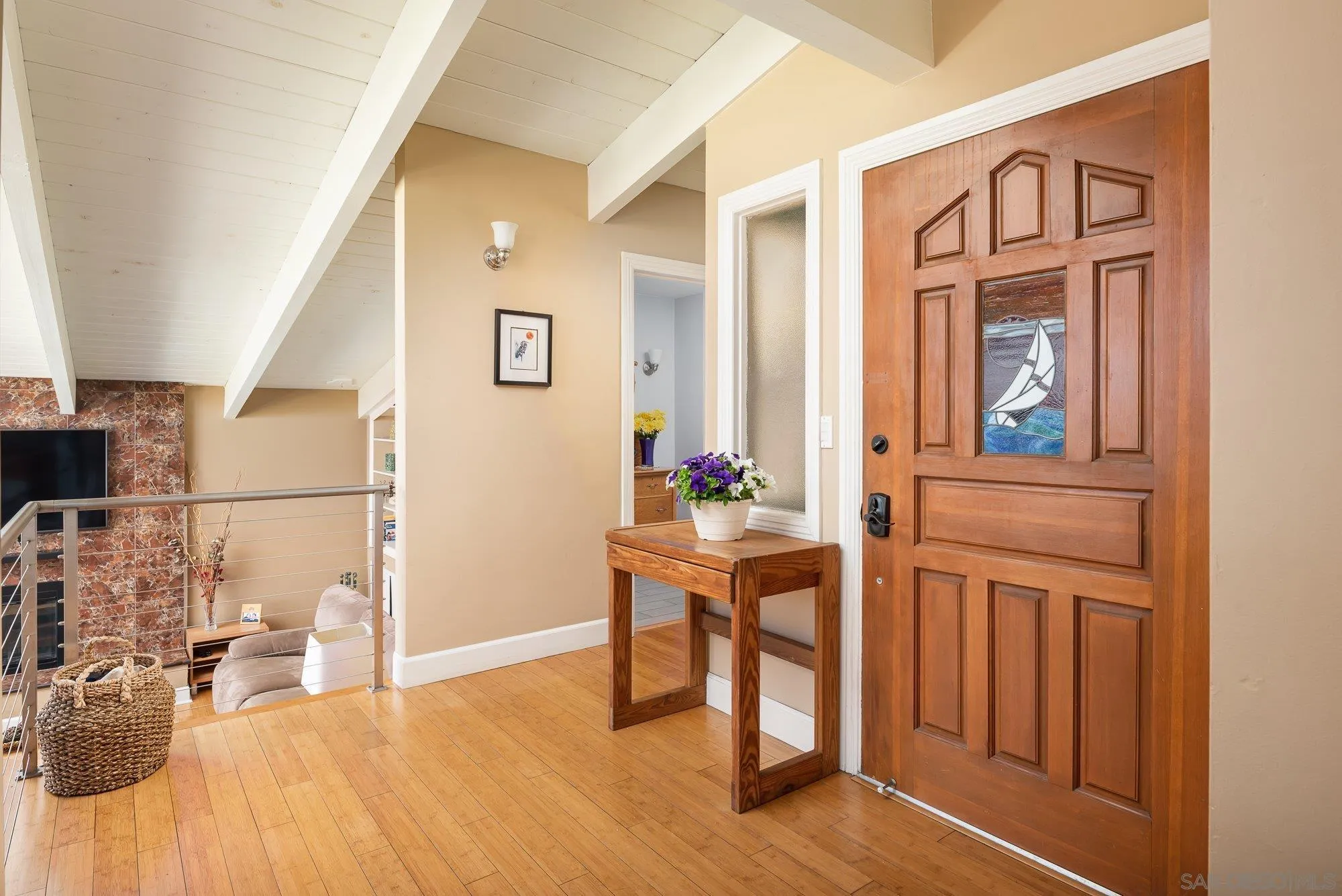 4361 Valle Drive La Mesa, CA 91941 - Photo 11 of 67 a view of a hallway with wooden floor and dining room