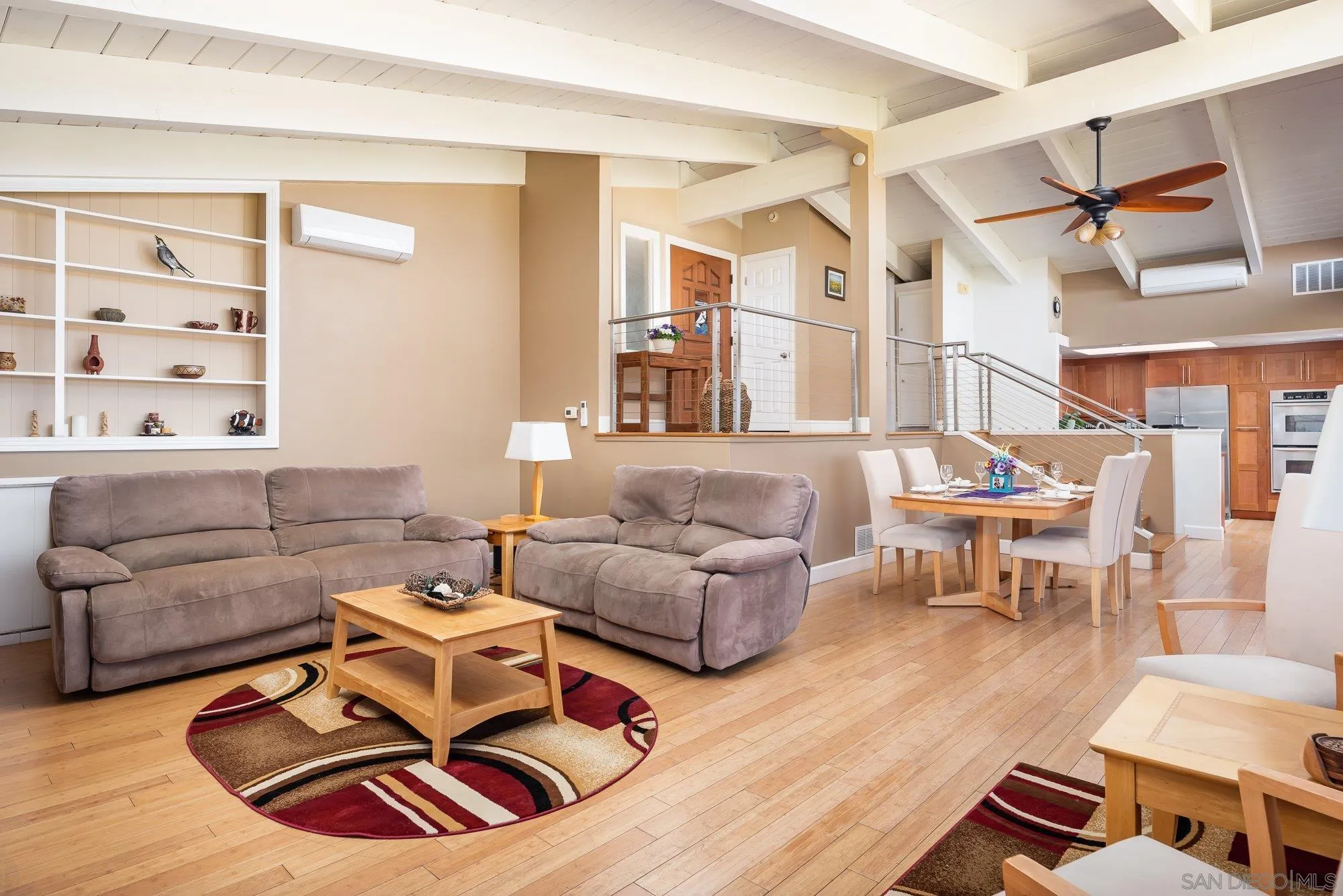 4361 Valle Drive La Mesa, CA 91941 - Photo 14 of 67 a living room with furniture and a wooden floor