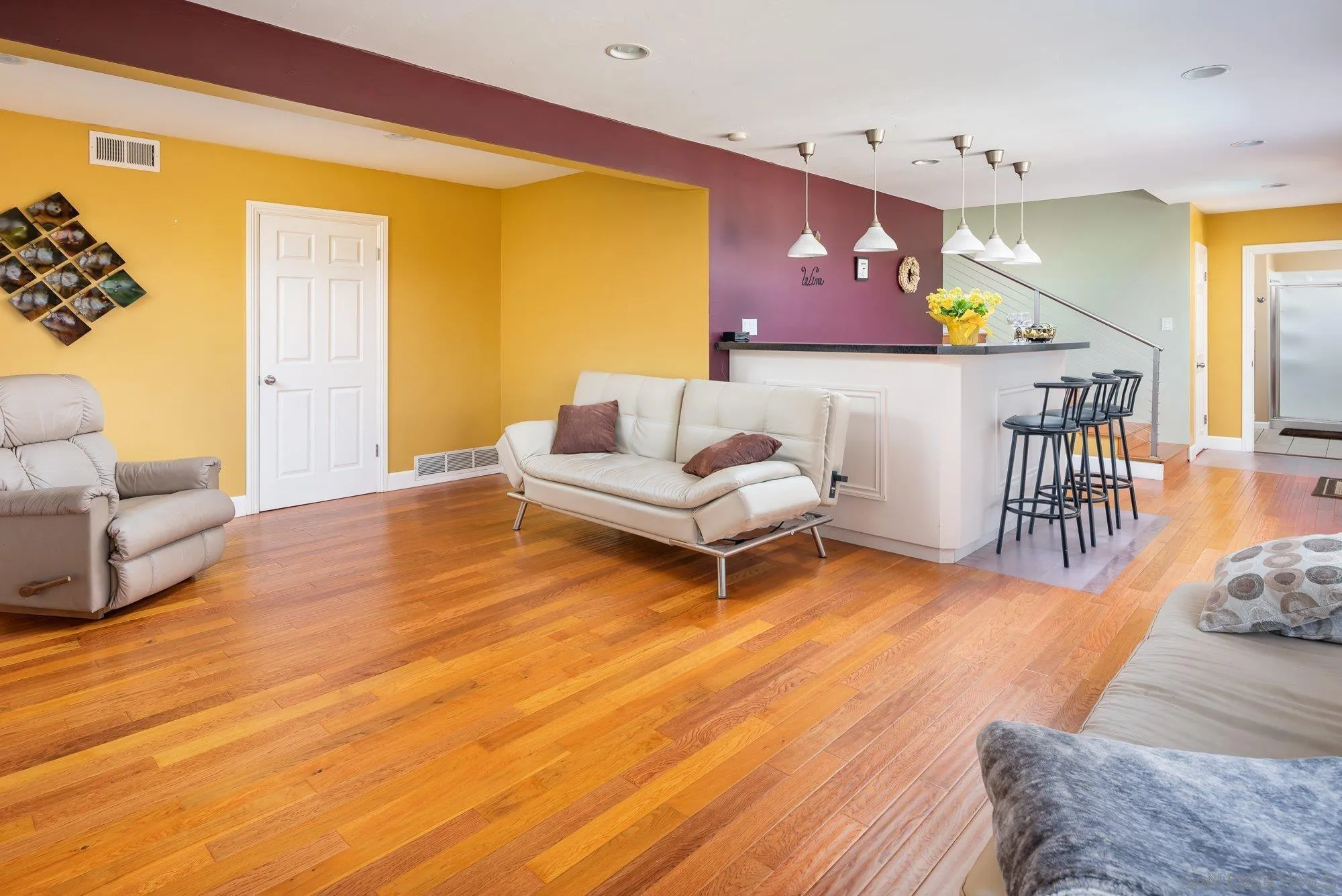 4361 Valle Drive La Mesa, CA 91941 - Photo 30 of 67 a living room with furniture and a wooden floor