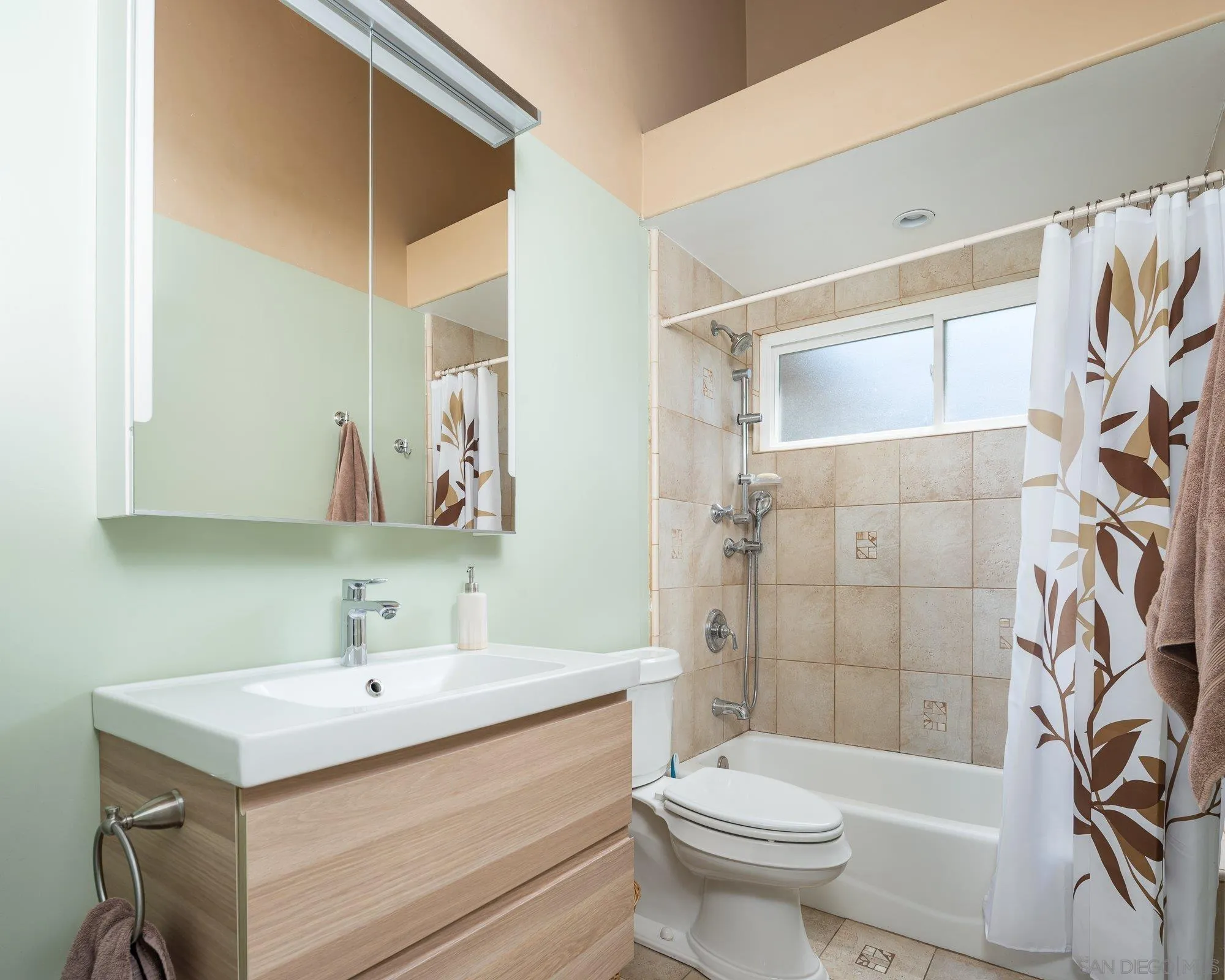 4361 Valle Drive La Mesa, CA 91941 - Photo 41 of 67 a bathroom with a sink toilet and shower