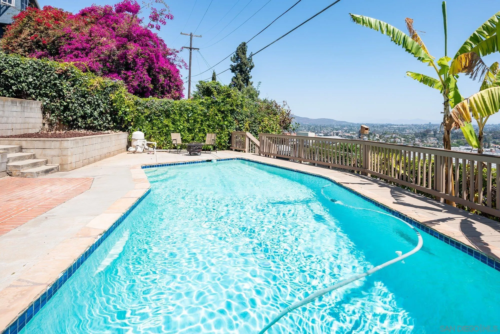 4361 Valle Drive La Mesa, CA 91941 - Photo 46 of 67 a swimming pool with outdoor seating and yard